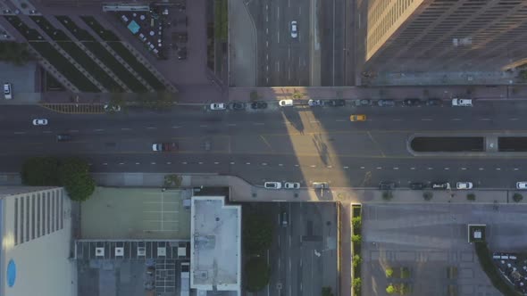 AERIAL: Slow Birds Eye View Flight Over Downtown Los Angeles California Grand Avenue in Beautiful