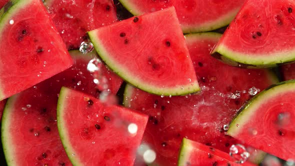 Super Slow Motion Shot of Splashing Water on Fresh Watermelon Slices at 1000Fps