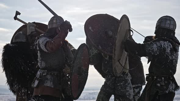 Warriors of Vikings Are Fighting During Attack at Winter Time.