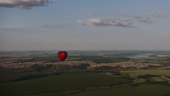 Balloon Hovering Above The Forest. Aerial View