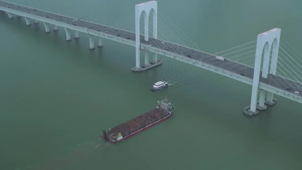 Hong Kong Barge Sails to Zhuhai Macao Bridge with Cars