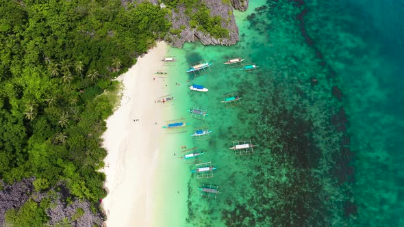 Boats and Tourists on the Beach