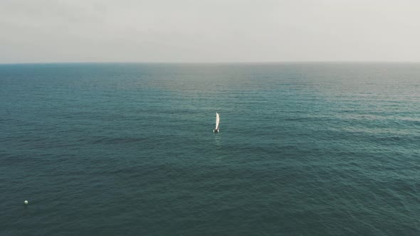 Aerial view of a catamaran in the middle of the sea.