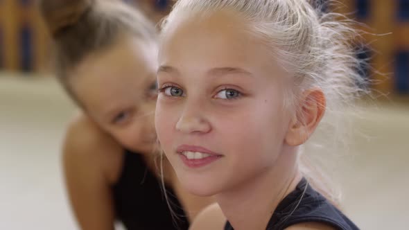 Young Girl Turning Head to Camera