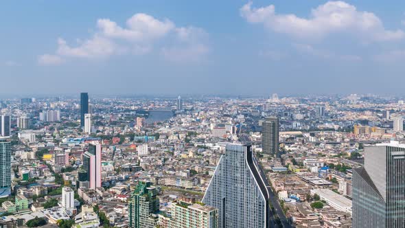 Bangkok business district city center and Chao Phraya River; panning right – Time Lapse