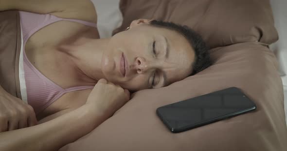 Lay in Bed with Smartphone