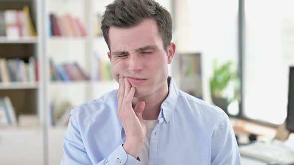 Young Man Having Toothache Tooth Infection