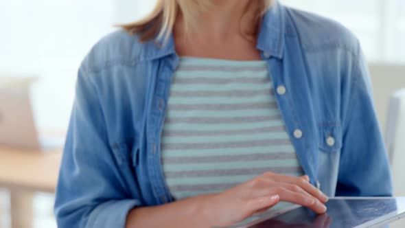 Businesswoman using digital tablet