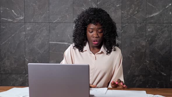 Stressed Afroamerican Businesswoman Shouts at Managers