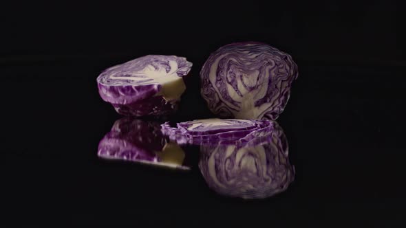 Purple Cabbage Spinning Slowly On The Mirror.