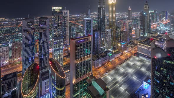 Skyline of the Buildings of Sheikh Zayed Road and DIFC Aerial Night Timelapse in Dubai UAE