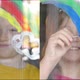 boy and girl are drawing rainbow on the home's windows in during coronavirus lockdown - VideoHive Item for Sale