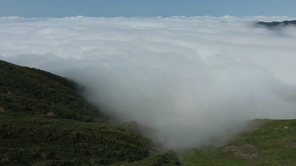 Fly Over a Mountain to the Clouds