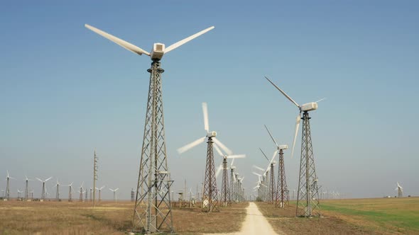 Field windmills generating green energy.