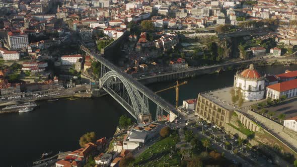 Aerial View of the City Metro Running on the Upper Deck of Iconic Bridge