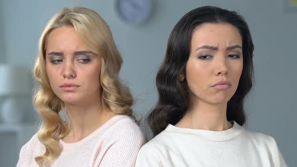 Two Attractive Women Sitting Separately, Best Friends Quarreling, Relations