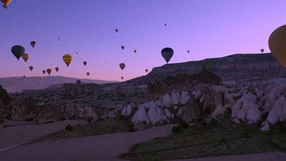 parade of balloons taking off at dawn in Cappadocia. travel concept