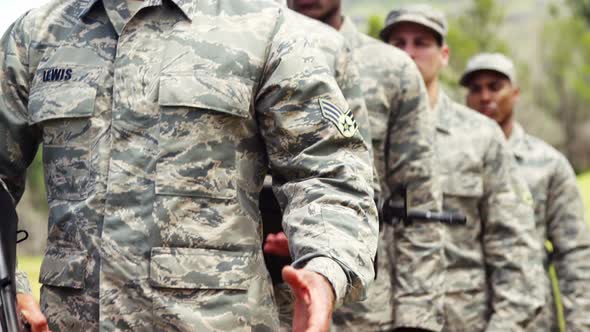 Group of military soldiers standing with rifles 4k