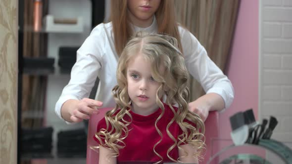 Little Caucasian Girl at Hairdresser