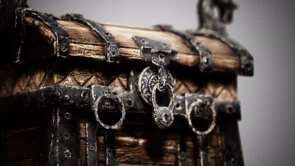 Closed Wooden Treasure Chest with Metal Clasp alt
