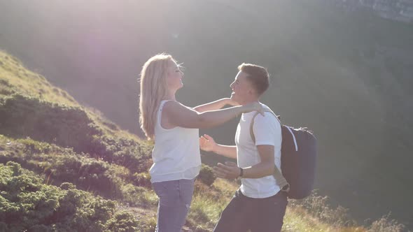 Couple holding hands and hugging alt