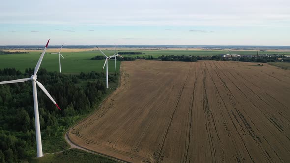 Windmills in Summer in a Green Field