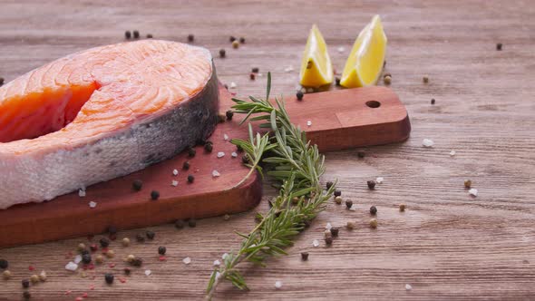 Seafood and Cooking Concept. Fresh Raw Salmon Steak with Spices