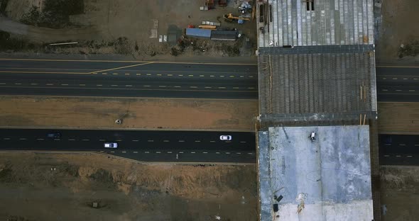 Flight Over the Construction of the Interchange Bridge on the Highway on Which Cars Go