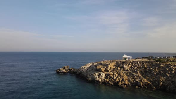 Church on the island. Aerial photography of the Mediterranean sights. Flight camera. Cyprus