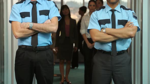 Portrait of two airport security guards