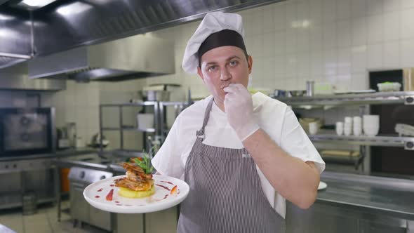 Positive Male Chef Gesturing Gusto Gesture Looking at Camera Smiling Bragging Cooked Prawn Served on