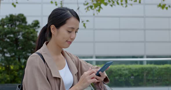 Woman use of mobile phone