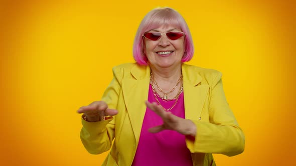 Senior Woman Listening Music Dancing Disco Fooling Around Having Fun Expressive Gesticulating Hands