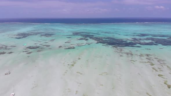 Ocean at Low Tide Aerial View Zanzibar Shallows of Coral Reef Paje Beach