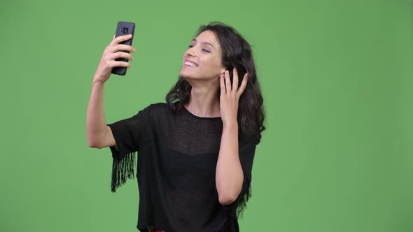 Young Beautiful Woman Using Phone