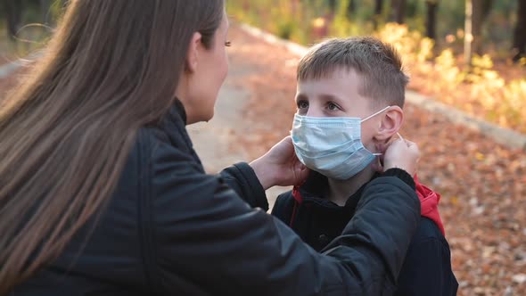 Mom Takes Off the Medical Mask From Her Son's Face