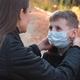 Mom Takes Off the Medical Mask From Her Son's Face - VideoHive Item for Sale