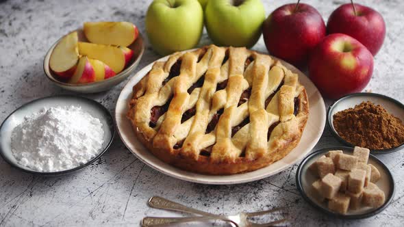 Fresh Baked Tasty Homemade Apple Pie Cake with Ingredients on Side