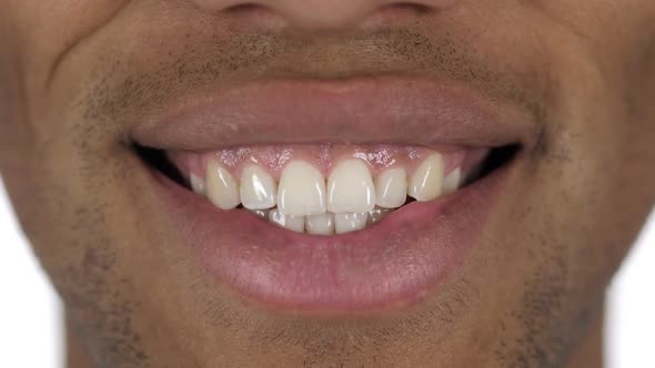 Close Up of Handsome Smiling AfroAmerican Man with White Teeth