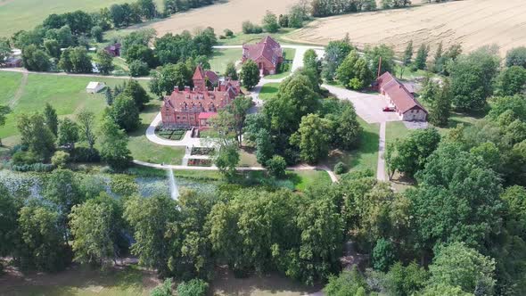 Jaunmoku Brick Medieval Castle Near Tukums, Latvia  Aerial Dron 4k Shot Jaunmokas Manor Park.