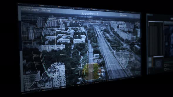 Hi-tech spy drone has identified the target vehicle escaping on the city road alt