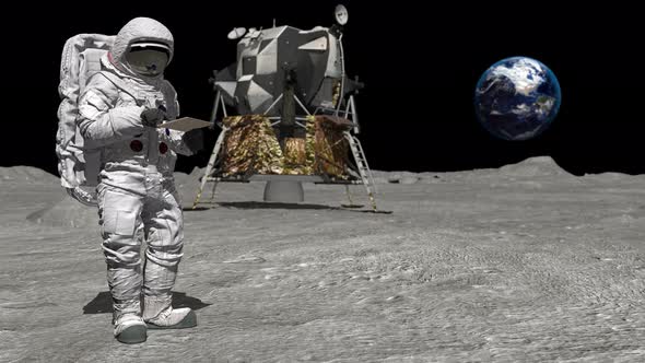 Astronaut on the Moon Typing on a Laptop alt