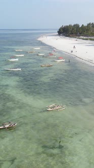 Boat Boats in the Ocean Near the Coast of Zanzibar Tanzania Slow Motion Vertical Video