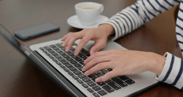 Woman type on laptop computer