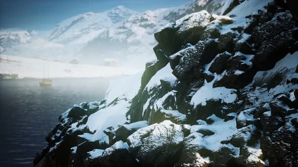 Snow Covered Mountains in Northern Ocean