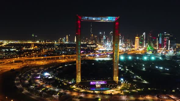 Aerial view of the illuminated Dubai Frame at night, U.A.E.