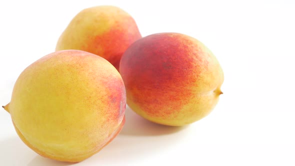 Peaches juicy fruit close-up  UHD 4K 2160p footage  - Peaches on white background 4K 3840X2160 UHD f