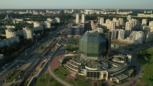 Top View of the National Library and a New Neighborhood with a Park in Minsk at Sunset