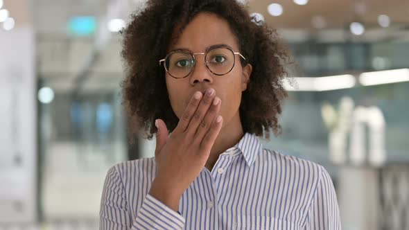 Surprised African Businesswoman Feeling Shocked