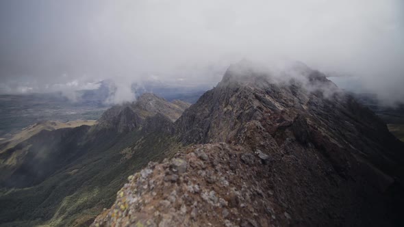 Landscape view from the peak of Ruminawi Volcano, Ecuador, on a cloudy day